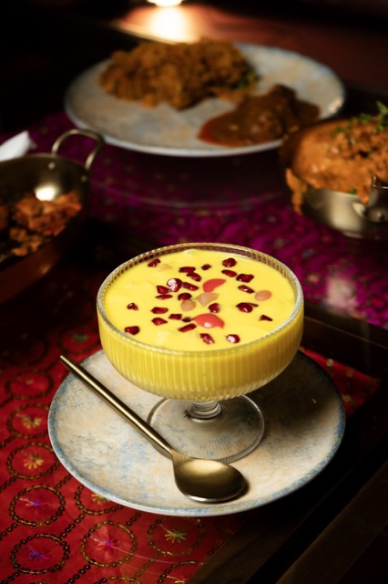 Saffron kheer in a glass bowl